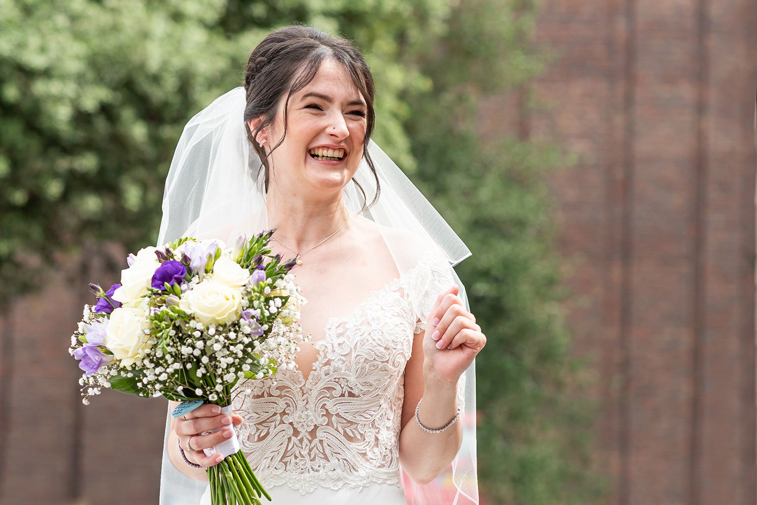 Bride portrait at arrival at church. Example of Bromley Wedding Documentary Photography by Piccolino Weddings 