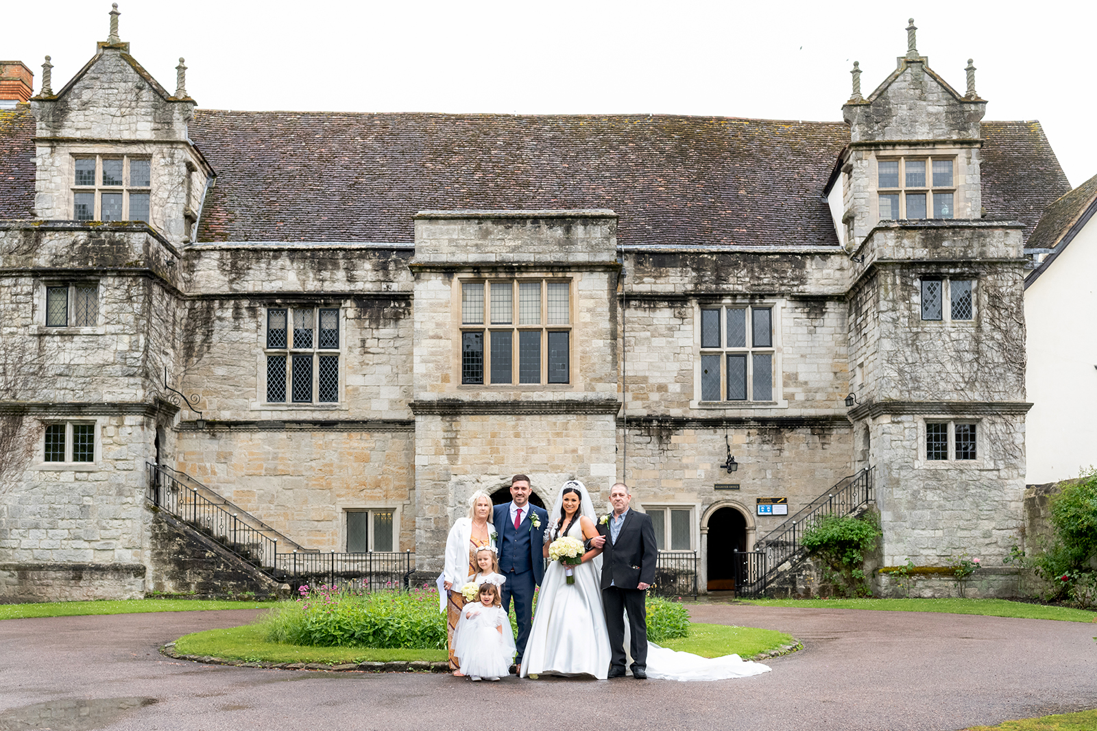 Group shot at Maidstone Archbishops Palace by Maidstone Wedding Photographer