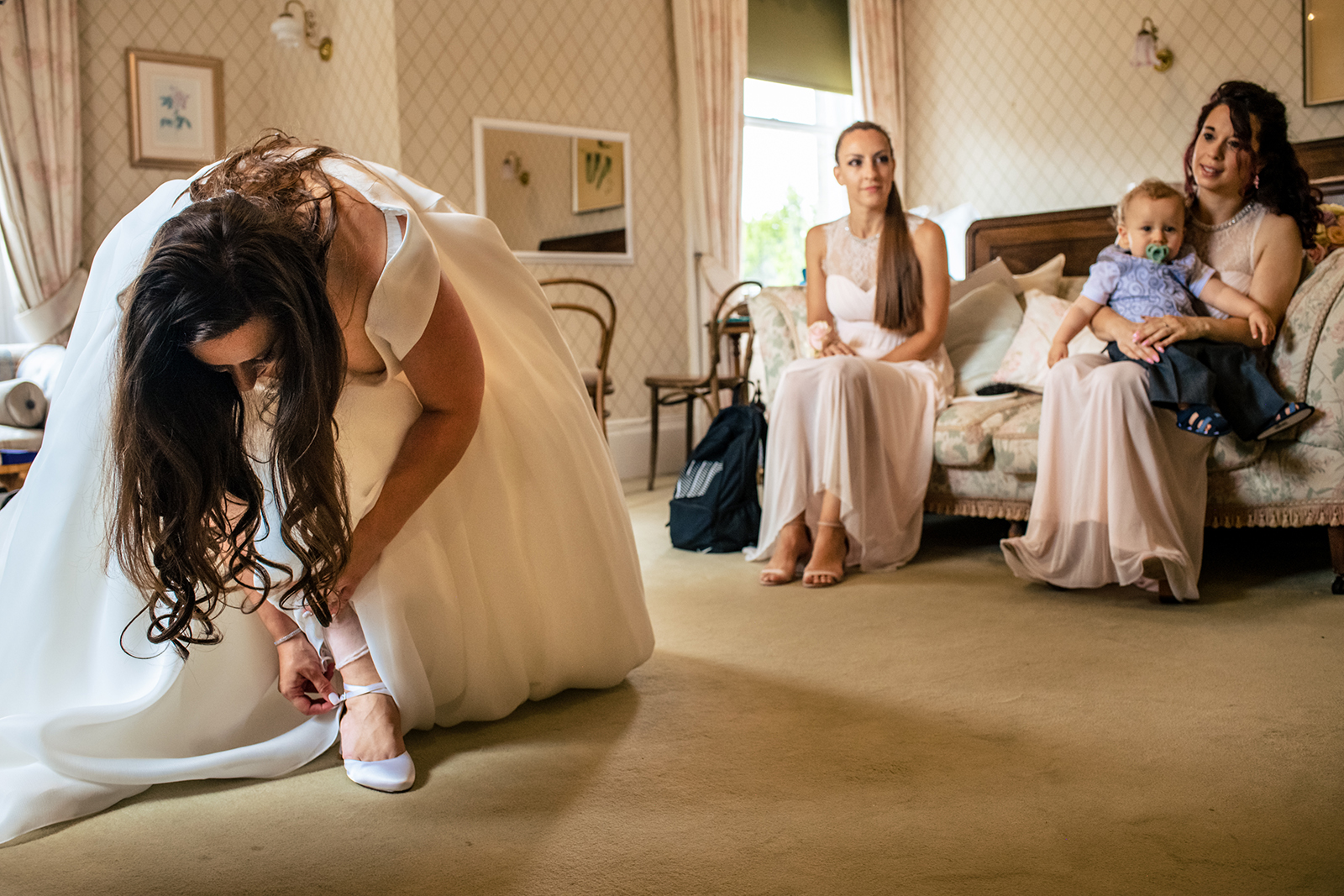 Bride getting ready with bride mates at Mount Ephraim Gardens