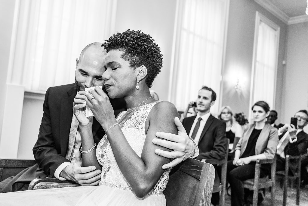 emotional moment of wedding couple during their ceremony at Chelsea Town Hall