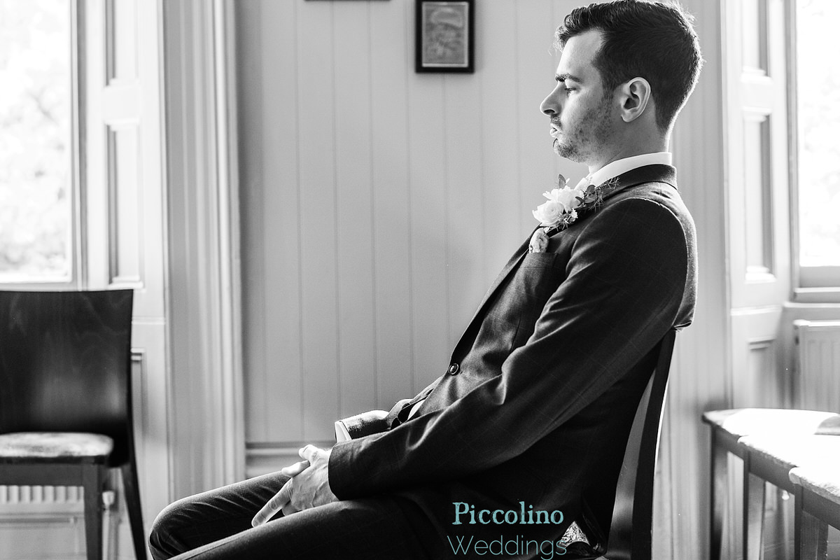 Groom waiting for the ceremony to begin at the Rosendale Pub in London