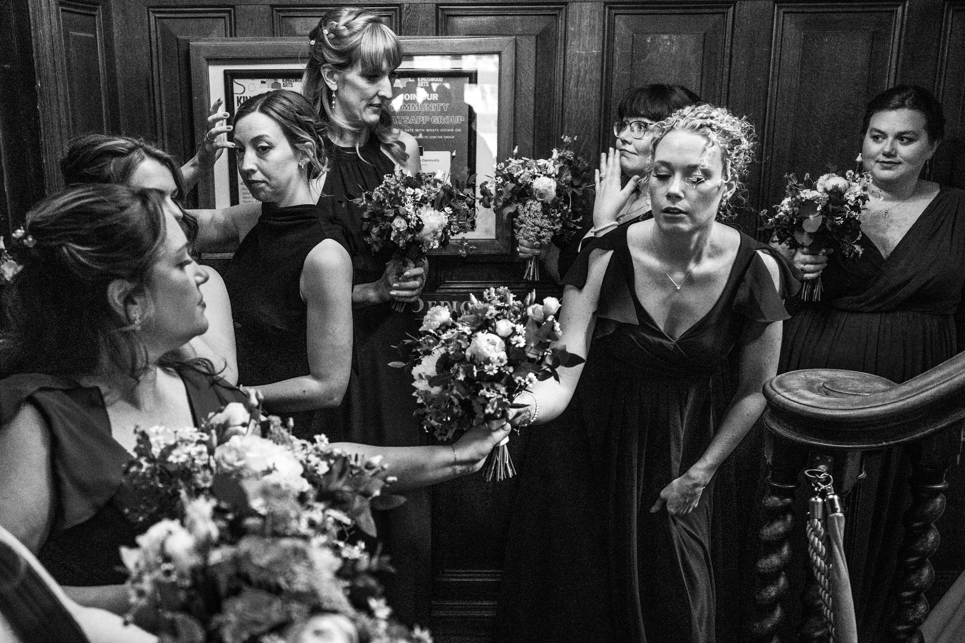 Bridesmaids getting ready before entering the ceremony at Kingswood Art