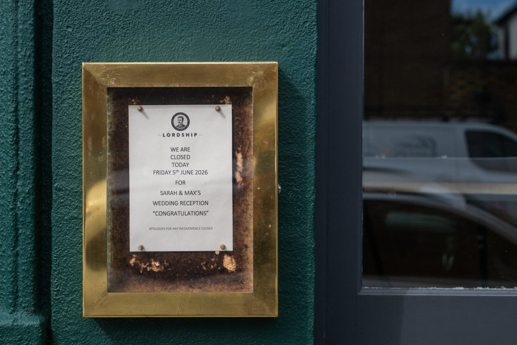 Sign outside The Lordship Pub, Dulwich, announcing it's closed for Sarah and Max's wedding reception